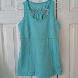 TUFF Athletic Sports Top Size Medium, slight flare.